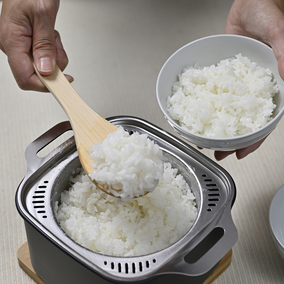 二人ぶんまでのご飯を、手早く美味しく炊き上げる。お米を研ぐ、炊く、片付けるまでを簡単に。新しいステンレス製炊飯鍋が誕生